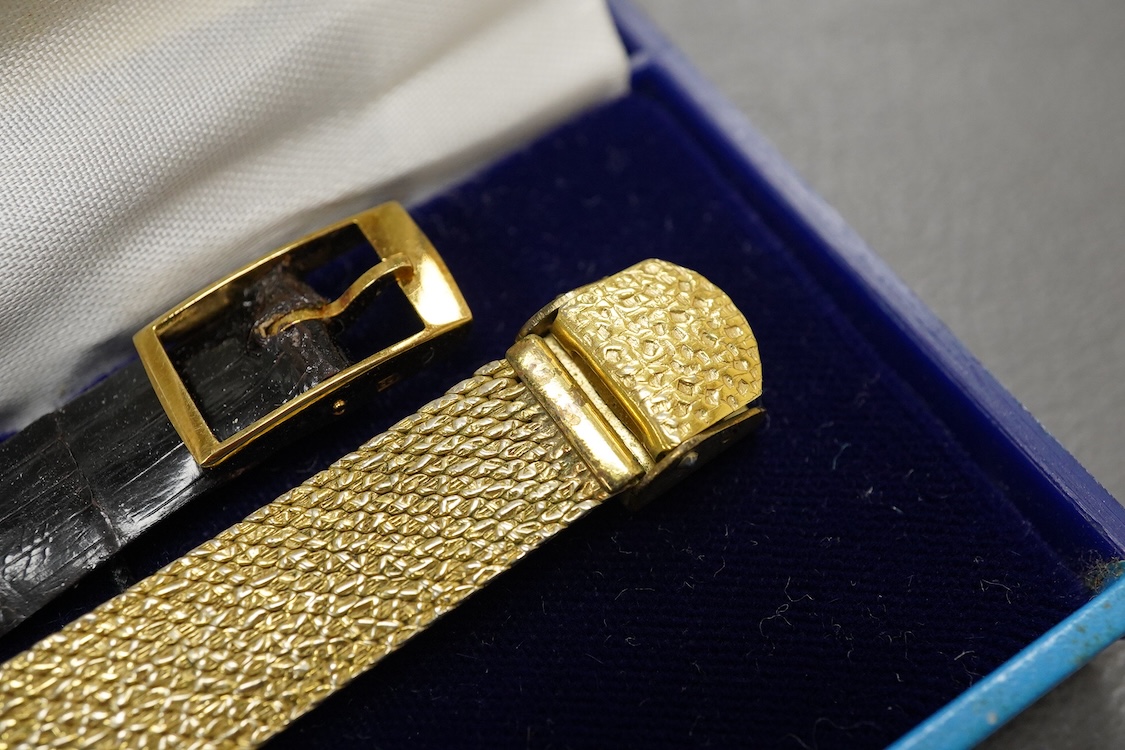 A gentleman's 18ct Girard-Perregaux manual wristwatch, oval brushed gilt dial with raised hour baton marks, seventeen jewels movement, signed, on an associated gilt metal articulated bracelet, in original case.